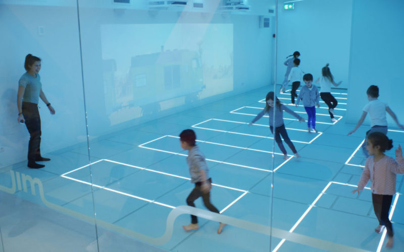Kids running with coach Friends call me Jim studio Amsterdam animation projection